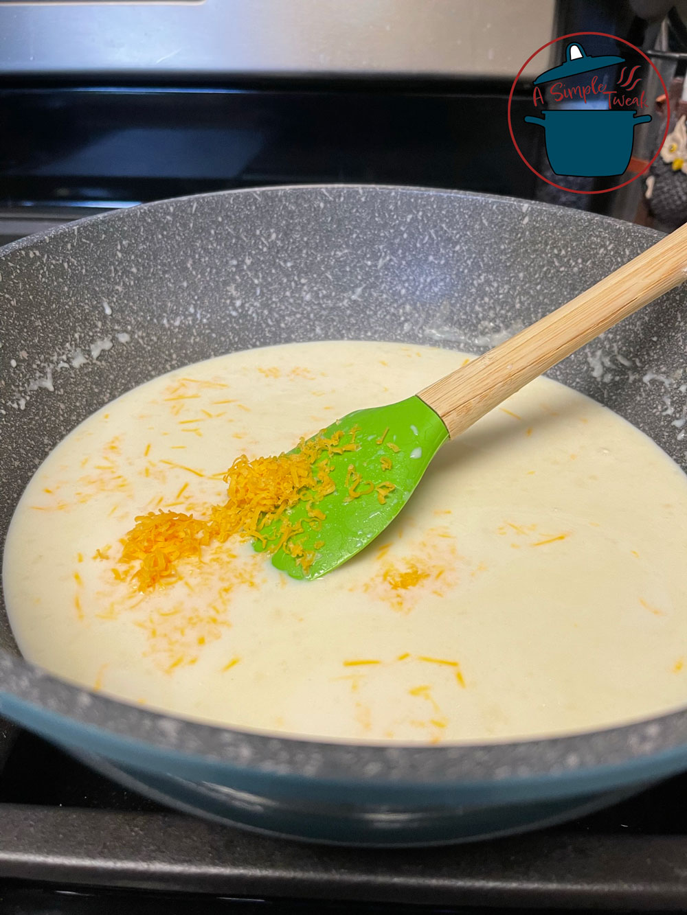 Simmer for 2 minutes, then stir in grated cheeses (saving some for topping). Stir until smooth and creamy. Simmer for 2 minutes, then stir in grated cheeses (saving some for topping). Stir until smooth and creamy.