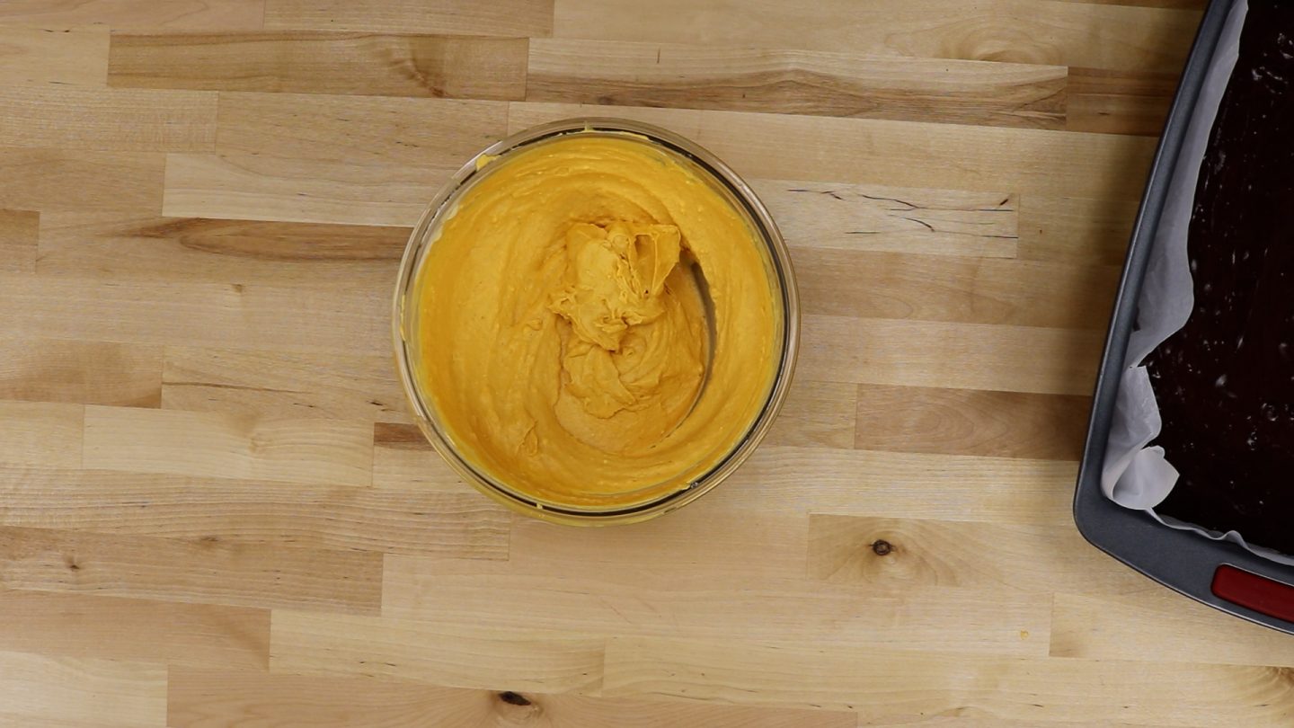 In a separate mixing bowl, combine the cream cheese, sugar, and pumpkin puree, and mix until smooth and combined. Pumpkin cream cheese mixture