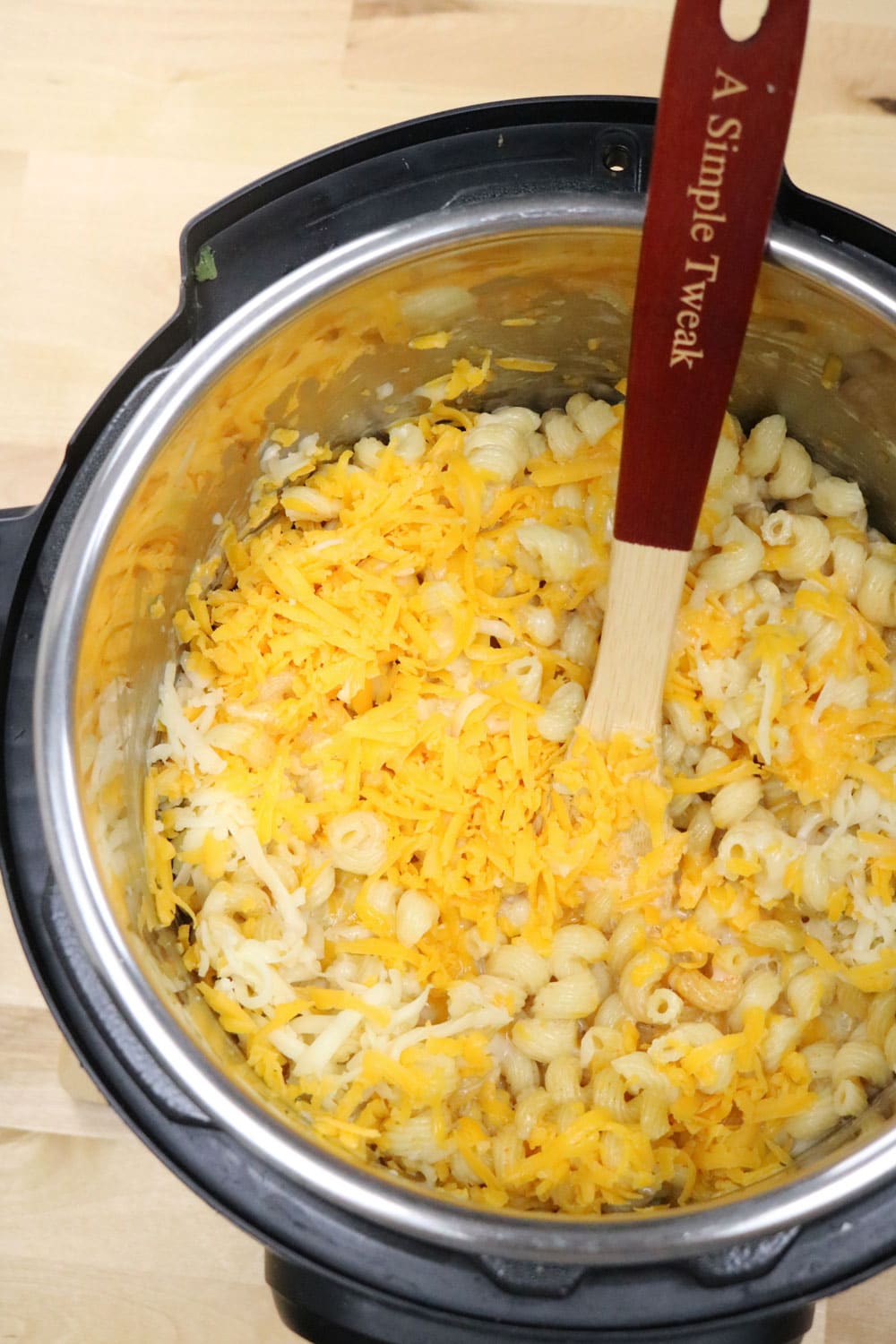 This is a cheesy creamy mac and cheese. Super-creamy-and-cheesy-Instant-Pot-Mac-and-Cheese-is-done-in-under-20-minutes.