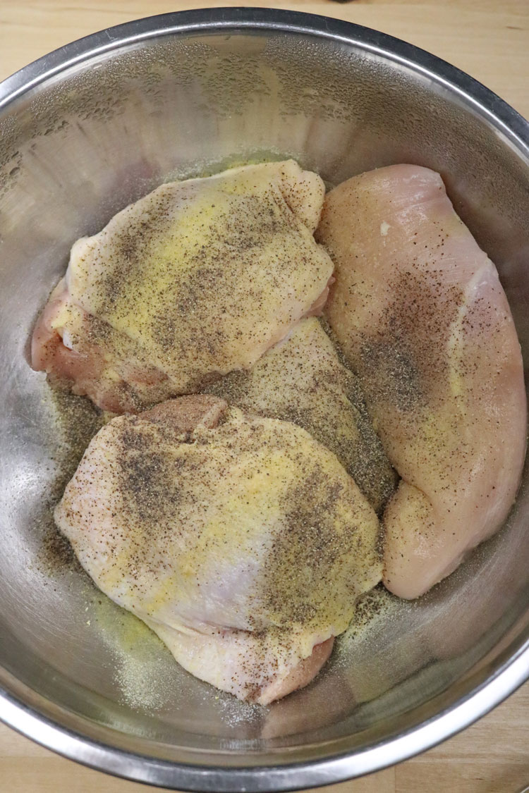 Season the chicken with salt and pepper. I use a combination of skinless, boneless chicken breasts and chicken thighs (skin and bone-in). Season-chicken-with-salt-and-pepper.