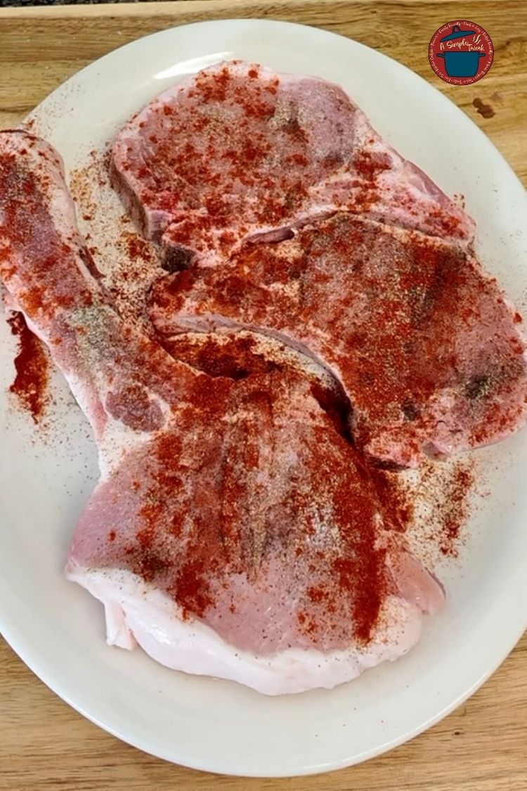 To add flavor, sprinkle salt, black pepper, and paprika on both sides. Ensure that both sides are seasoned well. Easy Pork Chops