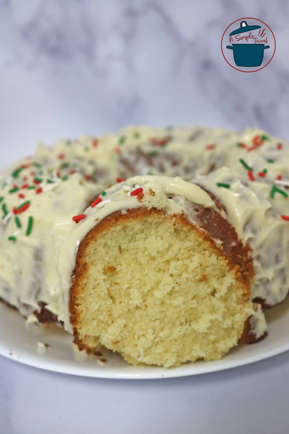 This Vanilla Cake Recipe is the perfect dessert for any occasion. Made entirely from scratch; It’s so light, fluffy, and easy to make that you’ll never go back to box mix!