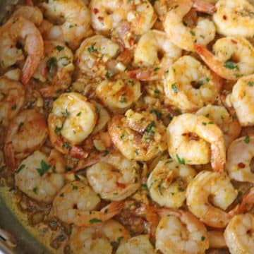 The-shrimp-cooked-to-perfection-in-a-blend-of-savory-garlic-and-rich,-creamy-butter.