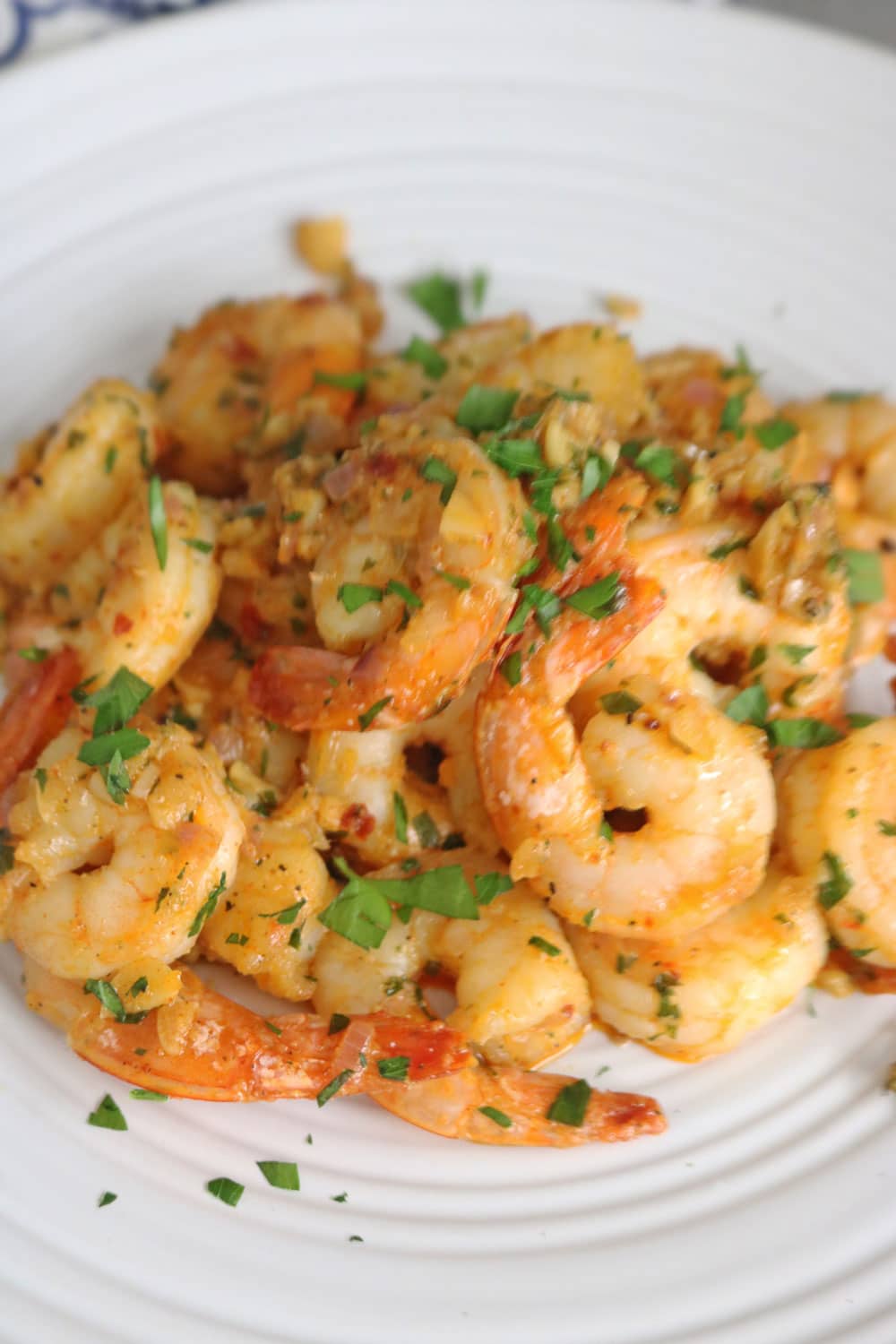 The-shrimp-is-cooked-to-perfection-in-a-rich-and-flavorful-garlic-butter-sauce-that-will-leave-your-guests-craving-for-more. The-shrimp-is-cooked-to-perfection-in-a-rich-and-flavorful-garlic-butter-sauce-that-will-leave-your-guests-craving-for-more.