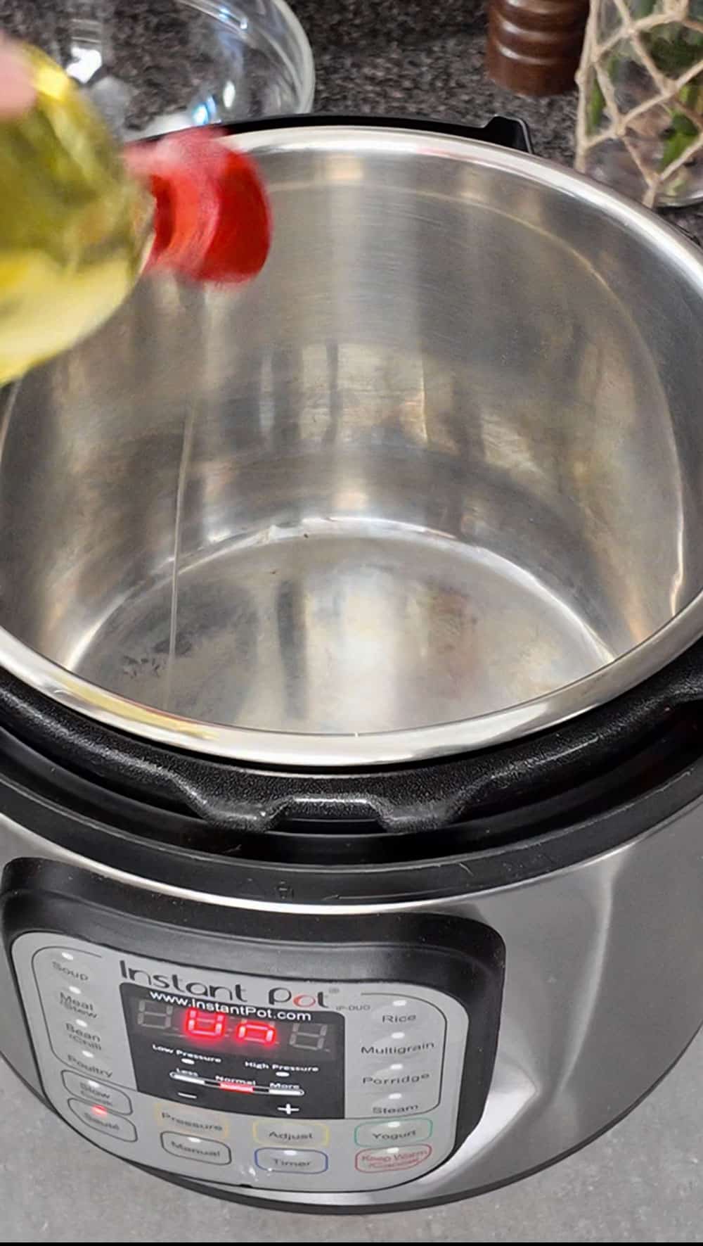 Set-your-pressure-cooker-or-instant-pot-to-the-Saute-setting-and-add-the-oil. Set-your-pressure-cooker-or-instant-pot-to-the-Saute-setting-and-add-the-oil.