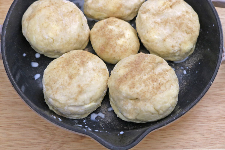 Brush the tops with buttermilk or heavy cream and sprinkle with sugar ( I am using cinnamon sugar). Brush-the-tops-with-buttermilk-or-heavy-cream-and-sprinkle-with-sugar-.-I-am-using-cinnamon-sugar.