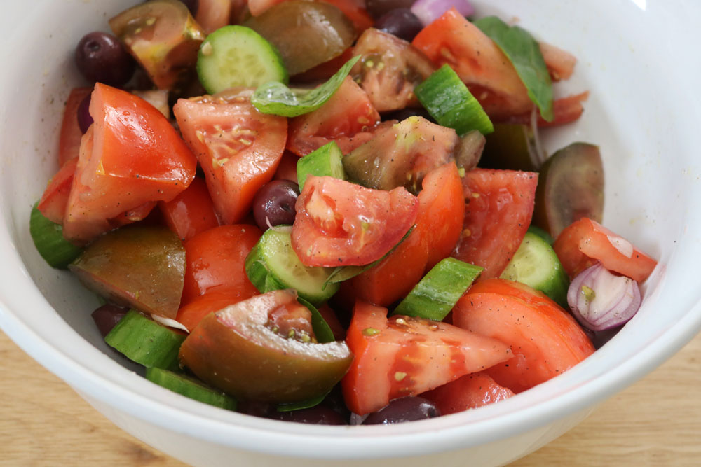 Slice up some crisp cucumbers and red onions, and don't be shy with the cuts. The crunch from the cucumbers and the sharp bite from the onions make every bite interesting and satisfying. Greek-Salad
