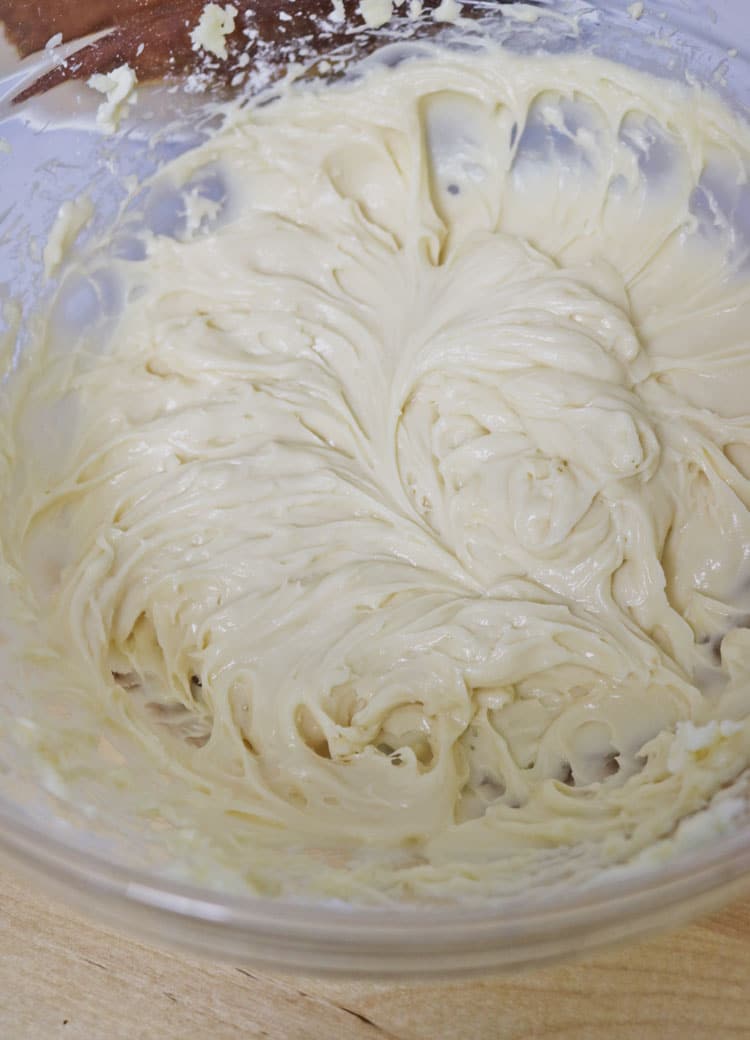 In a medium bowl, beat the cream cheese and butter until smooth and creamy. Gradually add the powdered sugar and a pinch of salt, beating until the frosting is smooth. Cream-Cheese-Frosting