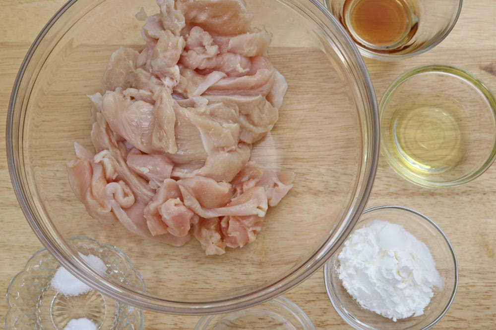 Cut the chicken breast into relatively small and thin pieces and place them into a bowl.ย Cut-the-chicken-breast-into-small-and-thin-pieces-and-place-them-into-a-bowl.