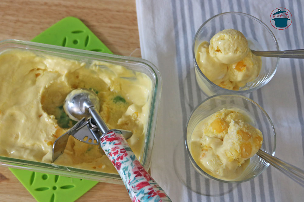 Scoop out your homemade mango ice cream into cups or cones. You can garnish with fresh mango slices or a sprig of mint for an extra touch. Scoop out your homemade mango ice cream into cups or cones. You can garnish with fresh mango slices or a sprig of mint for an extra touch.