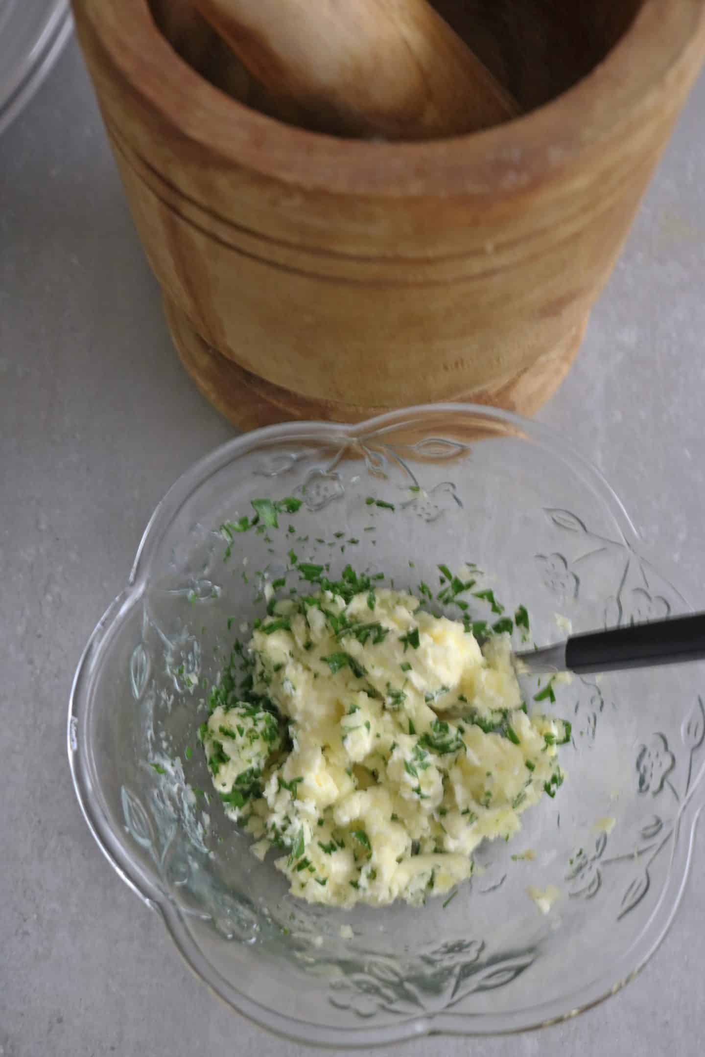 In a small container, combine the unsalted butter (room temperature), mashed garlic, and parsley. Stir until well incorporated. Garlic Butter