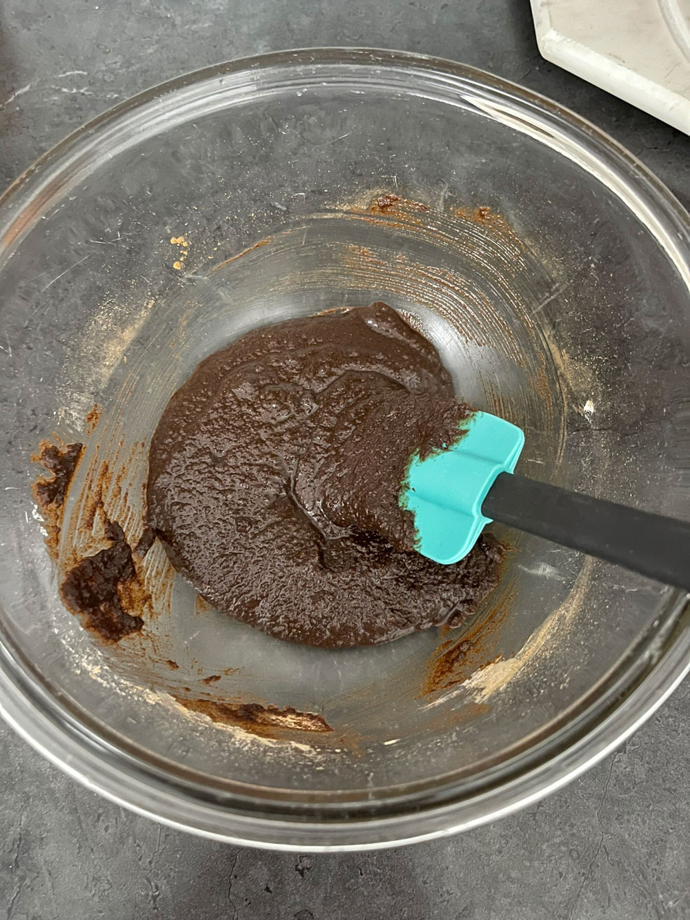 The first step is to make the cinnamon mixture. In a bowl add melted butter, brown sugar, ground cinnamon, and 2 tablespoons of all-purpose flour. Mix until well combined and set aside. Easy-Cinnamon-Cake-Recipe