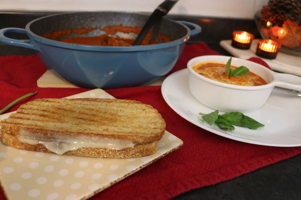 The-combination-of-roasted-tomatoes-and-red-peppers-creates-a-rich,-smoky-flavor-that-pairs-perfectly-with-your-favorite-bread-or-a-grilled-cheese-sandwich. The-combination-of-roasted-tomatoes-and-red-peppers-creates-a-rich,-smoky-flavor-that-pairs-perfectly-with-your-favorite-bread-or-a-grilled-cheese-sandwich.