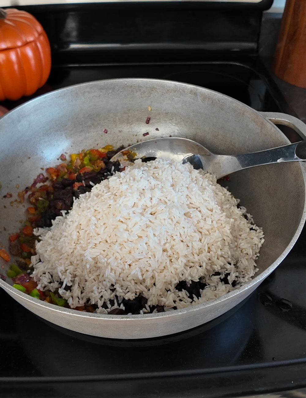 Add-the-beans-and-the-rinsed-rice. Add-the-beans-and-the-rinsed-rice.