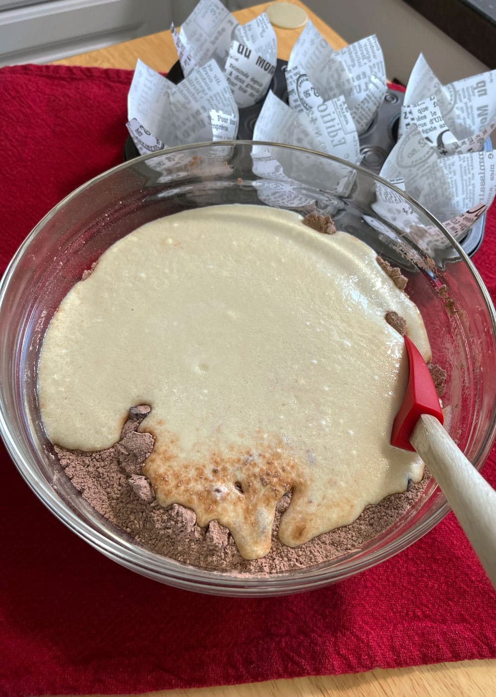 Pour the egg mixture (wet) into the flour mixture (dry) and fold using a silicone spatula or wooden spoon. The batter is quite thick, so I recommend avoiding using a whisk. I also recommend not overmixing. Combine-wet-and-dry-ingredients