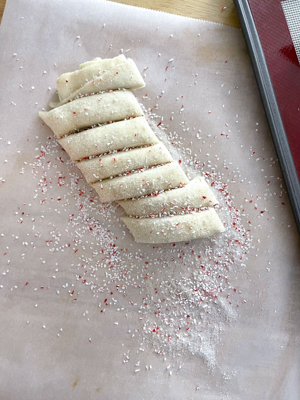 Use a sharp paring knife to cut the pastry into ½-inch-wide slices and place them on the lined baking sheet. I sprinkle some of them with peppermint dust. Easy-cookies